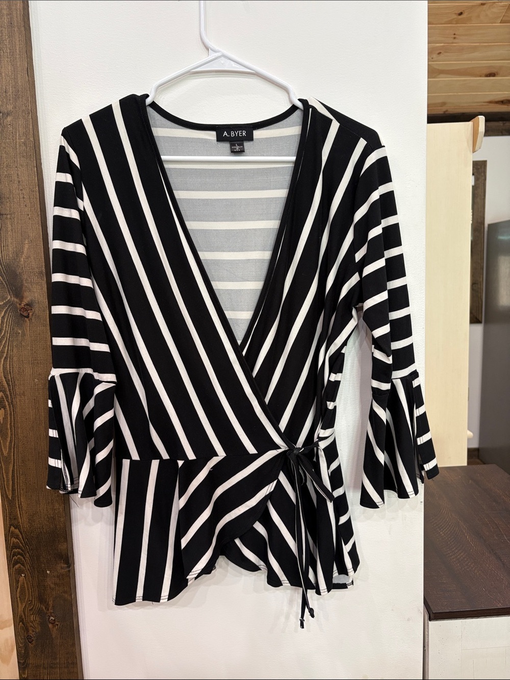 A. Byer Black and White Striped Wrap Blouse